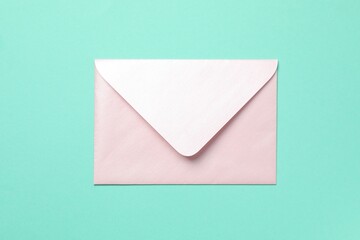 Paper envelope on color background. Empty greeting card for text design