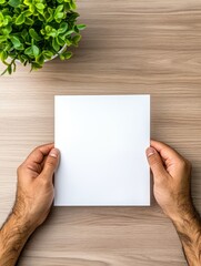 Fototapeta premium Blank Paper Mockup on Wooden Desk - Clean, simple, modern, presentation, workspace.