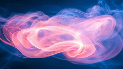 Fototapeta premium Abstract swirling pink and blue light trails on dark background.