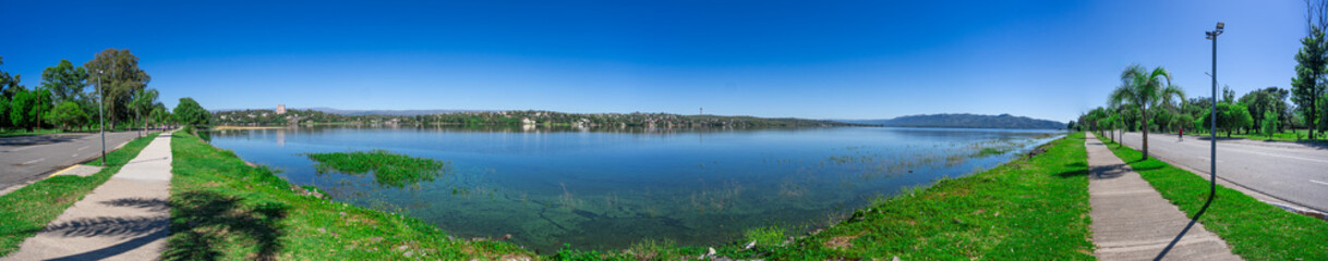panoramic of a lake with mountains in the background on a sunny summer day with xianobacteria in the water
sony a7III
16mm