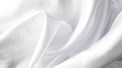 Soft flowing white veil background with gentle folds and airy chiffon texture