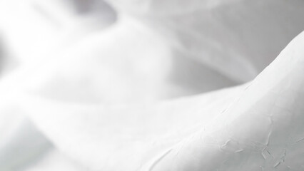 Minimalist white veil background with soft textures and sheer elegant design