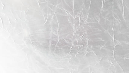 Soft flowing white veil background with gentle folds and airy chiffon texture
