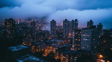 Fototapeta premium Night cityscape shrouded in mist and fog.