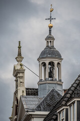 Fototapeta premium Top of church tower in the city 