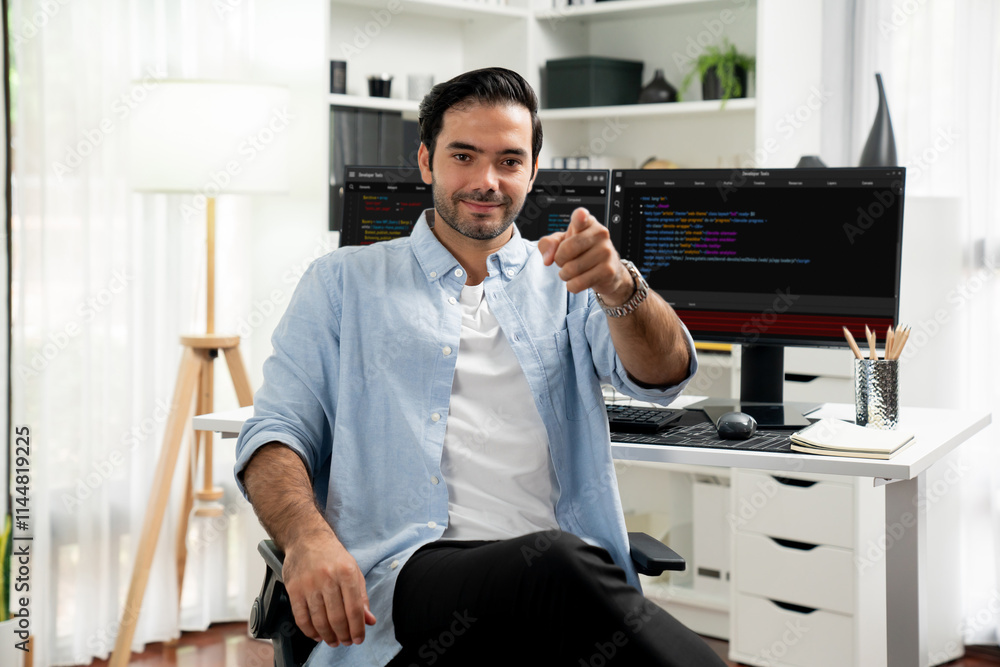Poster profile's smart it developer looking camera to pose against on software development coding on two pc