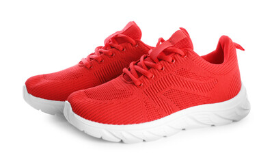 Pair of stylish red sneakers isolated on white