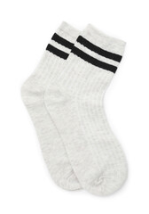 Pair of soft socks isolated on white, top view