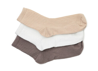 Pairs of soft socks isolated on white, top view