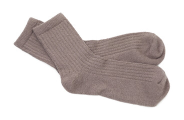 Pair of soft socks isolated on white, top view
