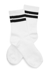 Pair of soft socks isolated on white, top view