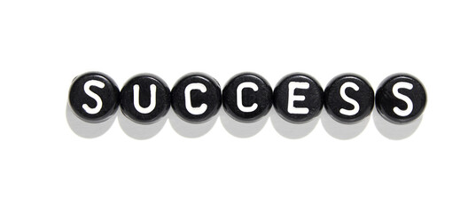 Minimalist alphabet beads arranged to spell success on white background for motivation and achievement concepts