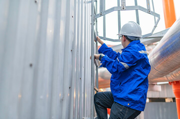 Engineer Overseeing Industrial Cooling System,Factory Technician Performing Machine Maintenance,Monitoring Machinery in Production Facility