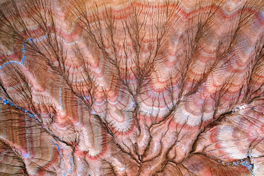 Aerial view of intricate patterns in eroded desert landscape