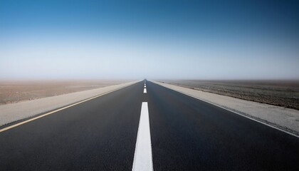 Fototapeta premium A straight road stretching into the horizon.