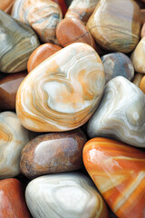 Smooth multicolored stones with unique patterns and textures