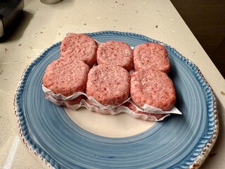Fresh raw beef meatballs on plate