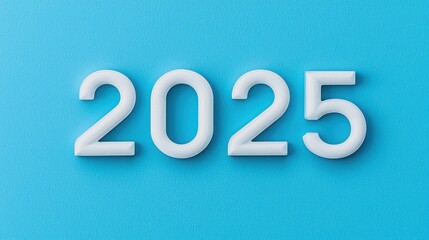 2025 goal setting motivation and strategy. Numbers "2025" on a blue background, symbolizing the upcoming year.