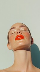 Elegant Portrait of a Woman with Christmas Makeup in Festive Light