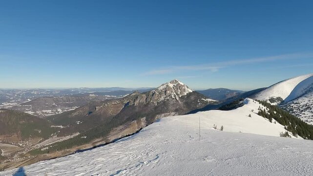 Snowshoeing with amazing view bellow Steny hill in winter Mala Fatra mountains in Slovakia
