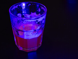 glass of fruit beer on table