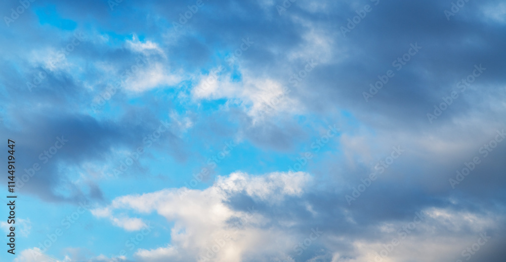 Wall mural beautiful tender sunrise sky with clouds. sky background.