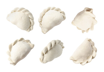 Many raw dumplings (varenyky) on white background