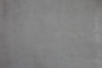 Abstract background of old gray plaster close-up.