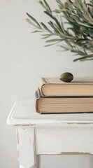Close-Up of Two Books on a White Wooden Coffee Table