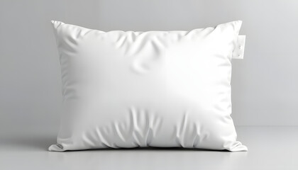 Plain white plush pillow on minimalist background for product display