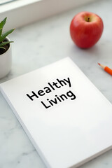 Healthy living concept with a text note and red apple placed on a modern desk worktable with a clean background._00002_