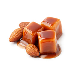 Caramel candy with almond nuts on white backgrounds