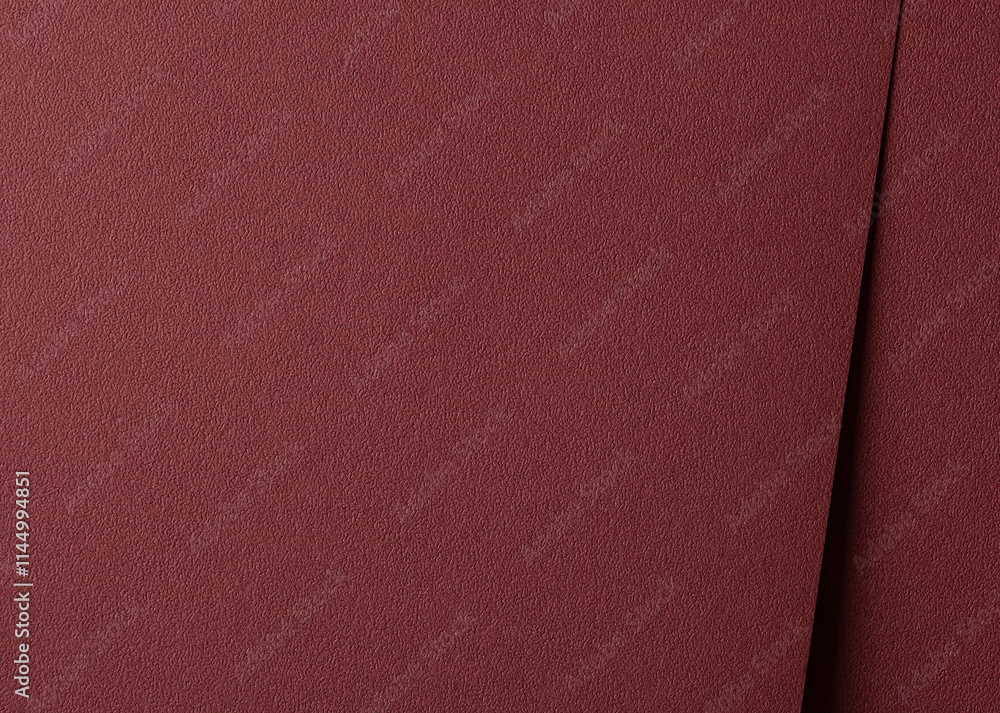 Poster luxury paper texture in deep marsala and brick red hues. matte and grainy surface with a rich, elega