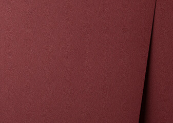 Luxury paper texture in deep marsala and brick red hues. Matte and grainy surface with a rich,...