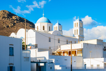 View of church building and typical Greek houses in Katapola village, Amorgos island, Cyclades,...