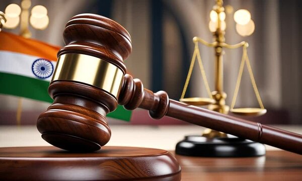 Judge's gavel with the Indian flag.