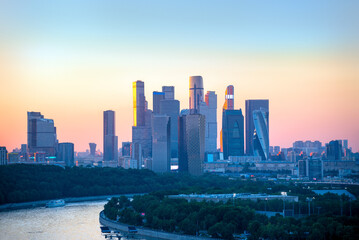 Fototapeta premium City skyline with skyscrapers at sunset