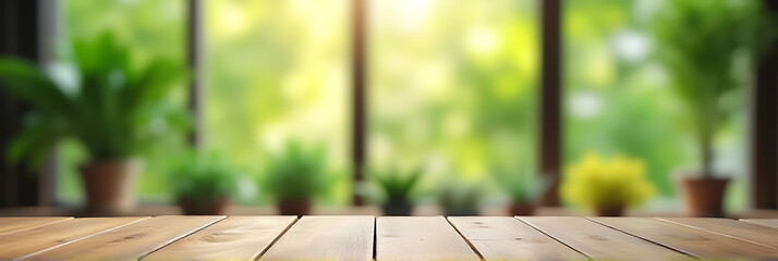 A wood table top blends with a blurry view of greenery through adjacent window panes and an abstract garden background._00003_