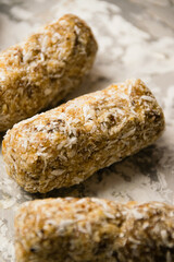 Delicious homemade energy bars without sugar on light background. Diet and healthy eating concept