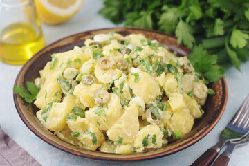 A bowl with Greek potato salads
