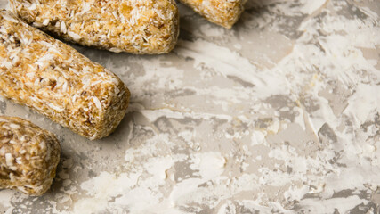 Delicious homemade energy bars without sugar on light background. Diet and healthy eating concept