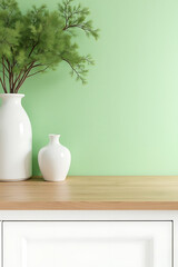 A simple wooden table sits atop a bright white countertop against a vibrant backdrop of fresh green florals and white walls._00003_