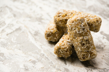Delicious homemade energy bars without sugar on light background. Diet and healthy eating concept