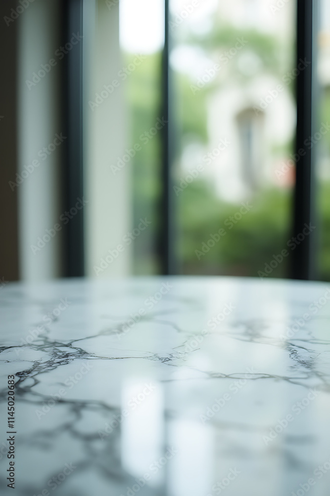 Poster a selectively focused image of a marble table top against a blurred abstract window glass background