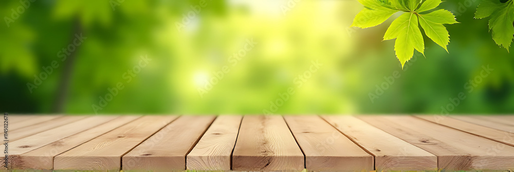 Poster a real wood tabletop texture with blurred leaves of a tree on a garden background is ideal for produ