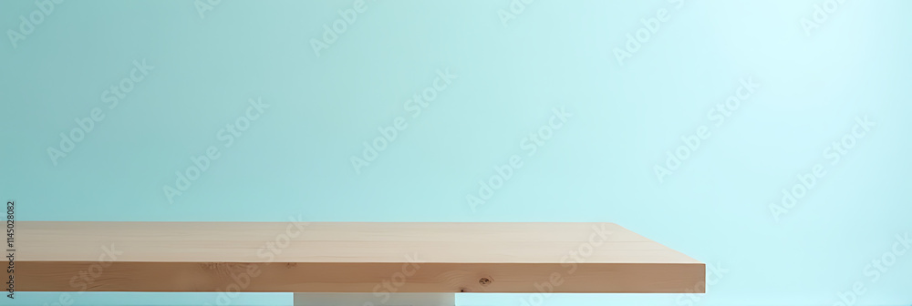 Poster a minimalist wooden table top on a soft blue background, ideal for product displays and key visuals 