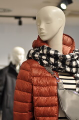 Mannequin close up with Italian style clothing. A close up of a mannequin with modern Italian style clothing in a shop window