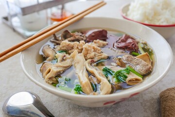 Thai Style breakfast Clear Soup with Congealed pork blood . Thai Traditional boiled soup pig blood supply , 