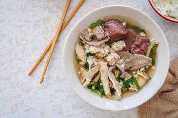 Thai Style breakfast Clear Soup with Congealed pork blood . Thai Traditional boiled soup pig blood supply , 