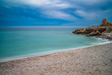 Long Exposure of Torrecilla Beach and Coastal View in Nerja, Spain